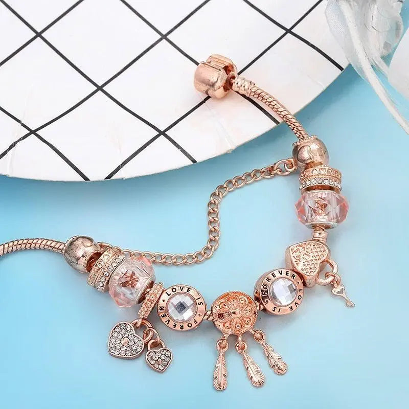 Pulsera atrapasueños rosa con charms de plata incluidos