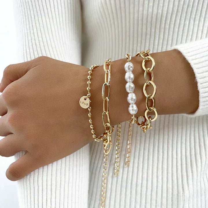 Set de pulseras de perlas doradas