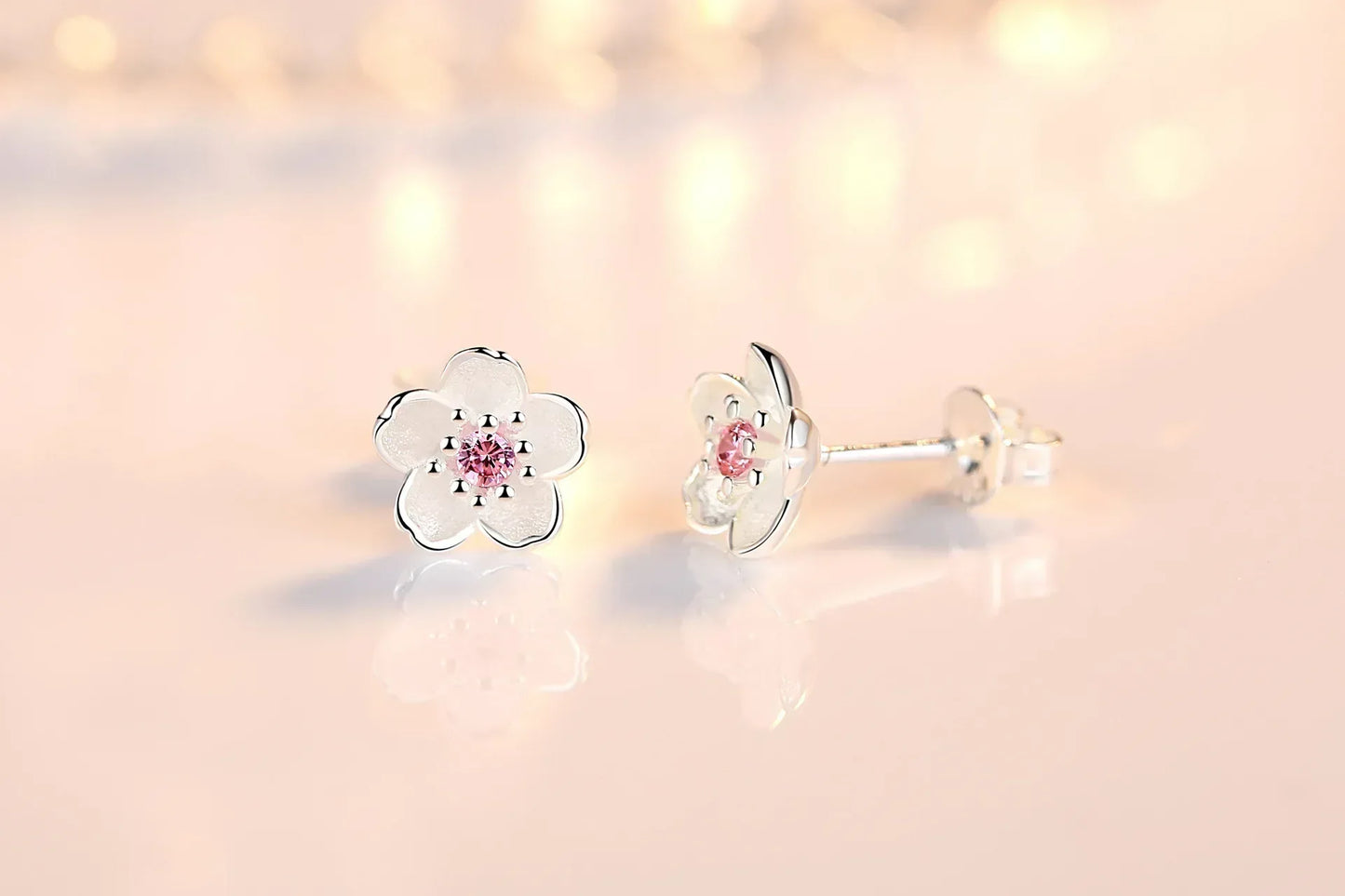 Pendientes de botón en forma de flor con circonita