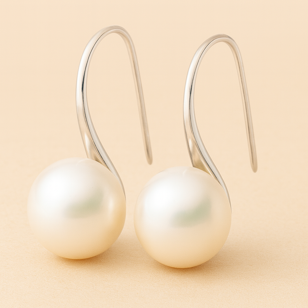Pendientes elegantes de gota con perlas