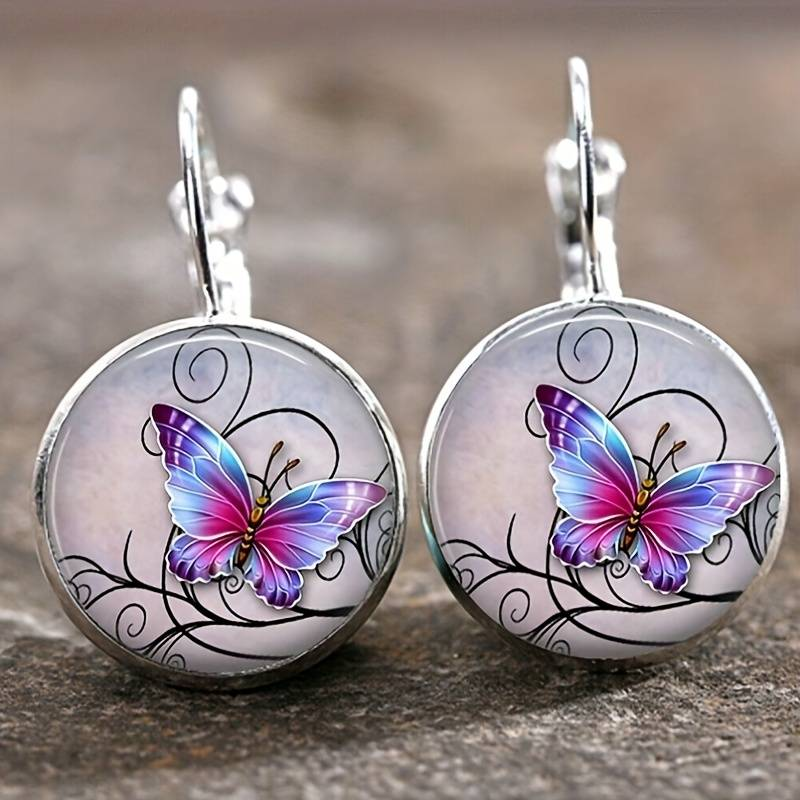 Pendientes vintage de mariposa con cristales redondos