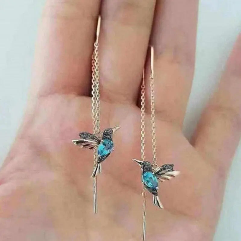 Pendientes de hilo con colibrí en oro y cristales