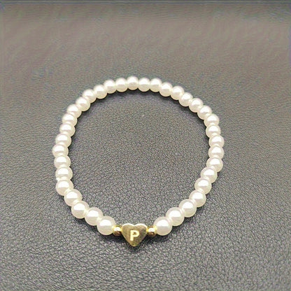 Pulsera chic con inicial de corazón (A–Z)