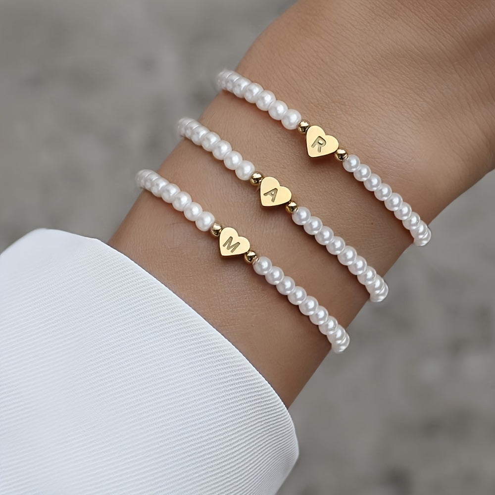Pulsera chic con inicial de corazón (A–Z)