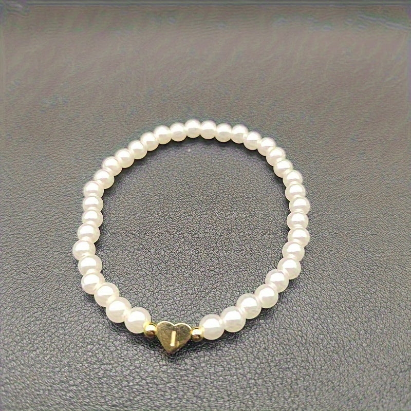 Pulsera chic con inicial de corazón (A–Z)