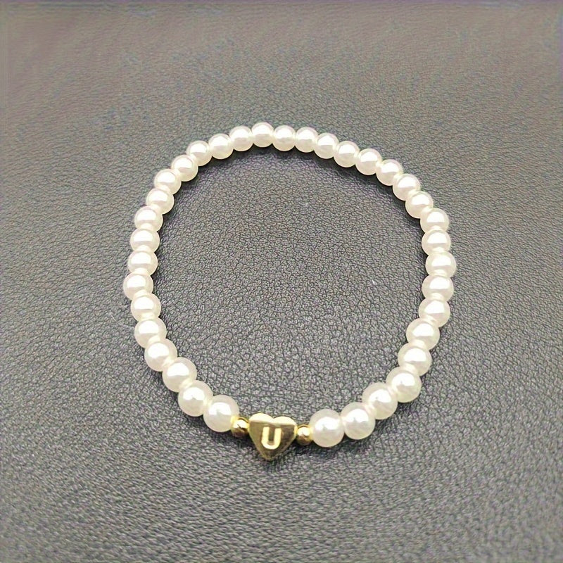Pulsera chic con inicial de corazón (A–Z)