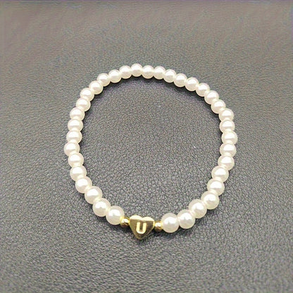 Pulsera chic con inicial de corazón (A–Z)