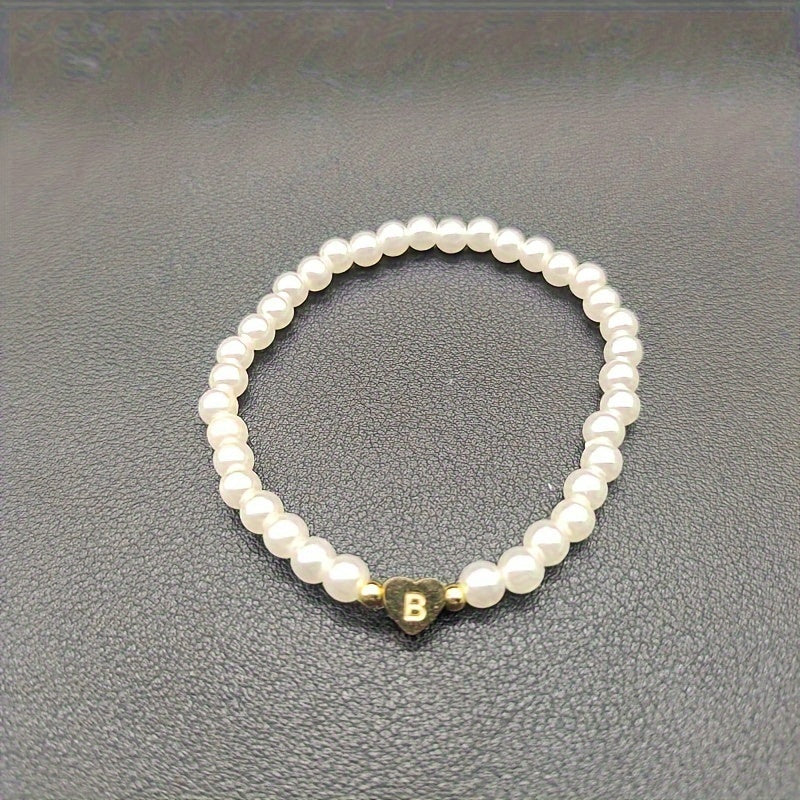 Pulsera chic con inicial de corazón (A–Z)