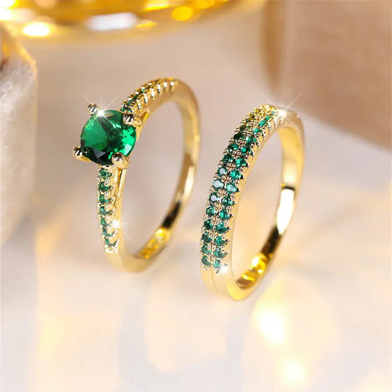 Set dúo de anillos con esmeralda en oro