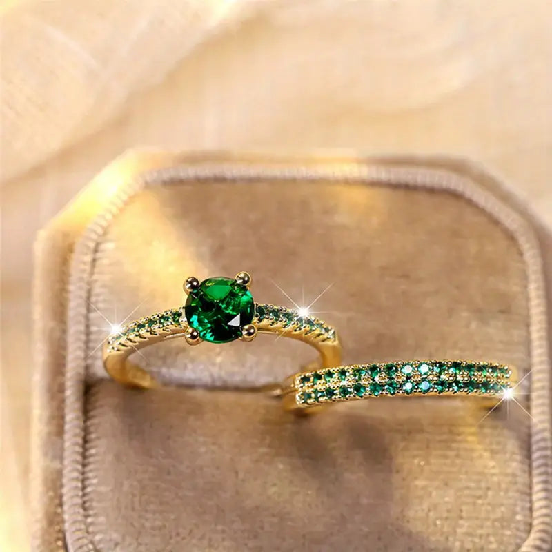 Set dúo de anillos con esmeralda en oro