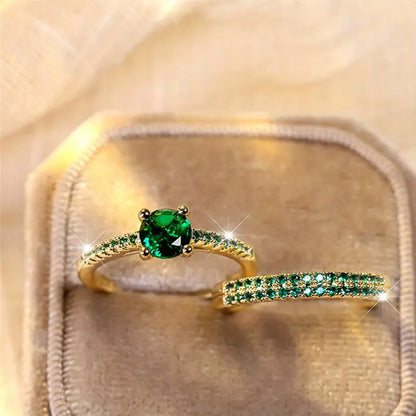 Set dúo de anillos con esmeralda en oro