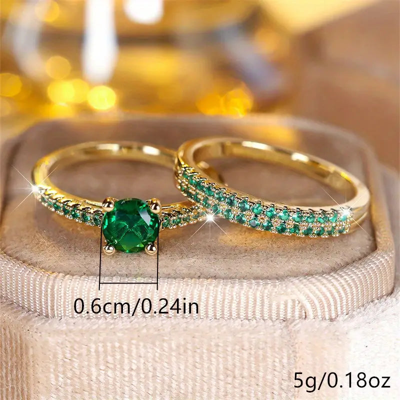 Set dúo de anillos con esmeralda en oro
