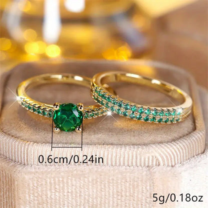 Set dúo de anillos con esmeralda en oro