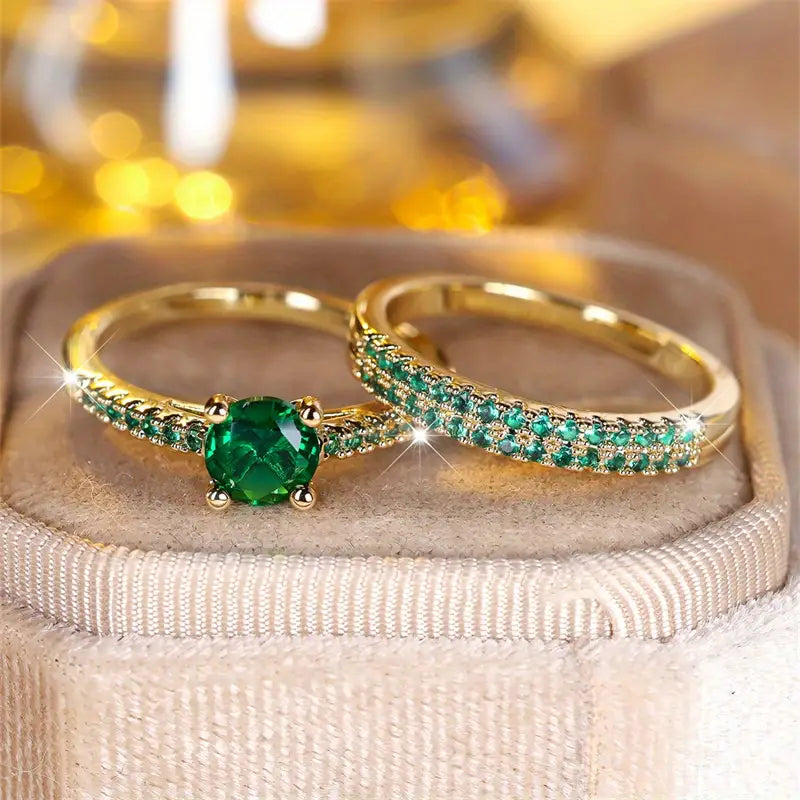 Set dúo de anillos con esmeralda en oro