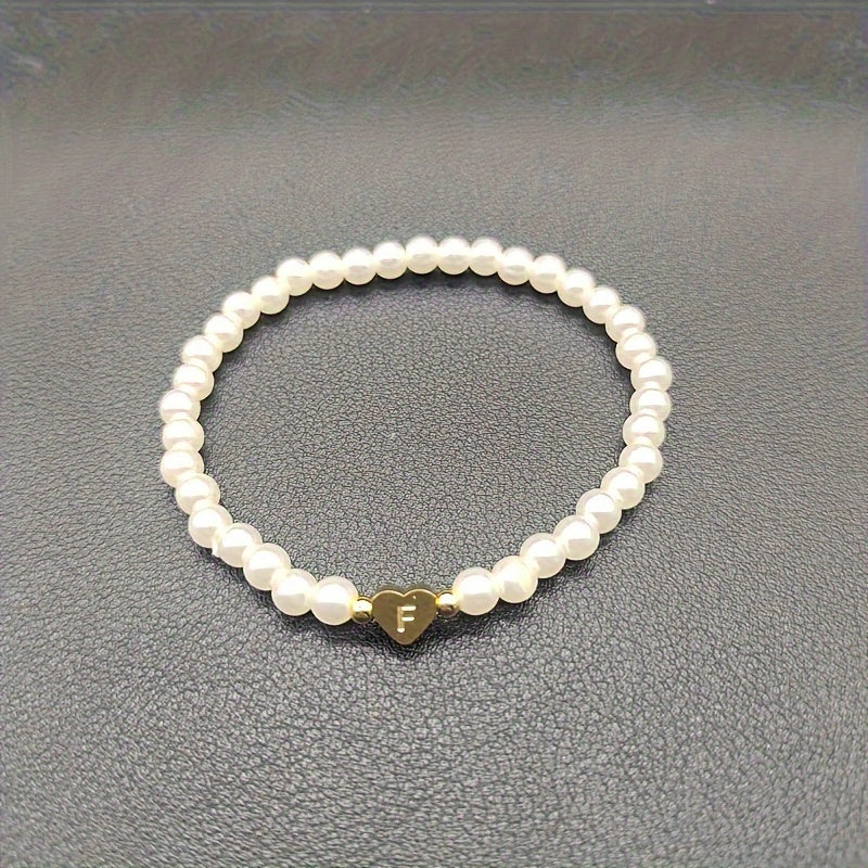 Pulsera chic con inicial de corazón (A–Z)