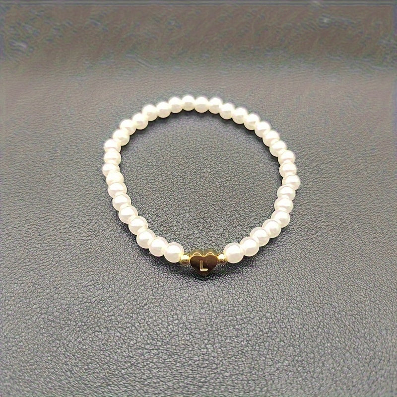 Pulsera chic con inicial de corazón (A–Z)