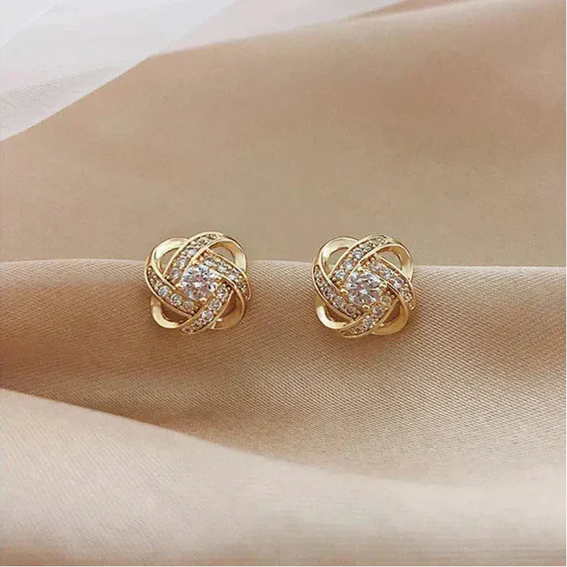 Pendientes espirales de oro con cristales