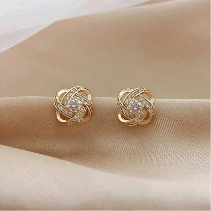 Pendientes espirales de oro con cristales