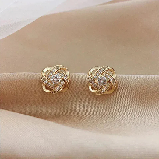 Pendientes espirales de oro con cristales