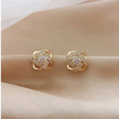 Pendientes espirales de oro con cristales
