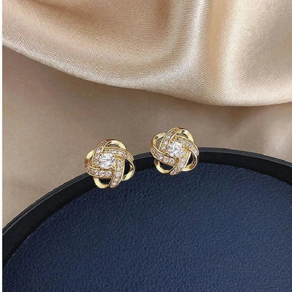 Pendientes espirales de oro con cristales