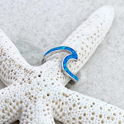 Anillo ondulado de plata con ópalo azul