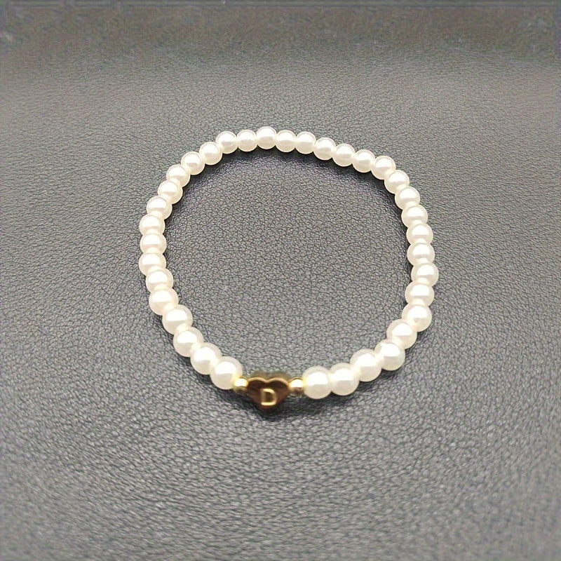 Pulsera chic con inicial de corazón (A–Z)