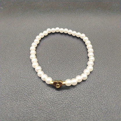 Pulsera chic con inicial de corazón (A–Z)