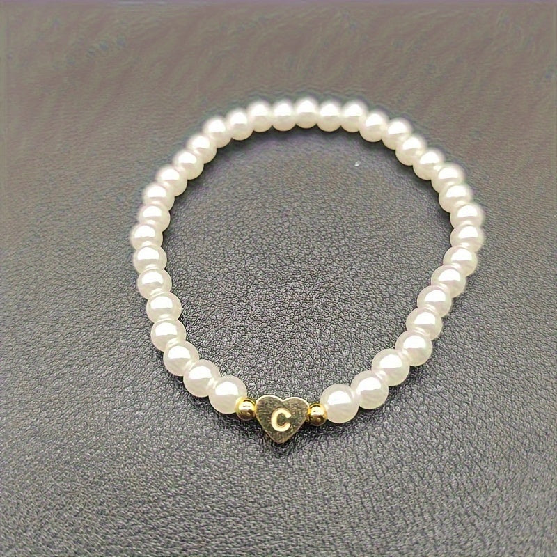 Pulsera chic con inicial de corazón (A–Z)