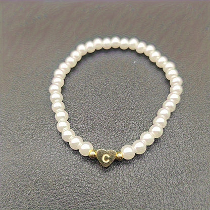 Pulsera chic con inicial de corazón (A–Z)