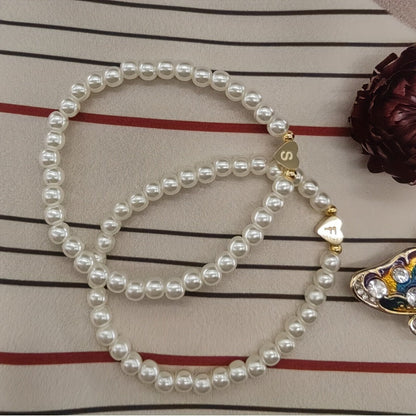 Pulsera chic con inicial de corazón (A–Z)