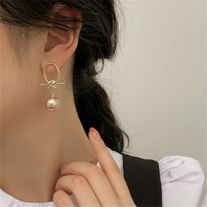Pendientes colgantes con perla atemporal