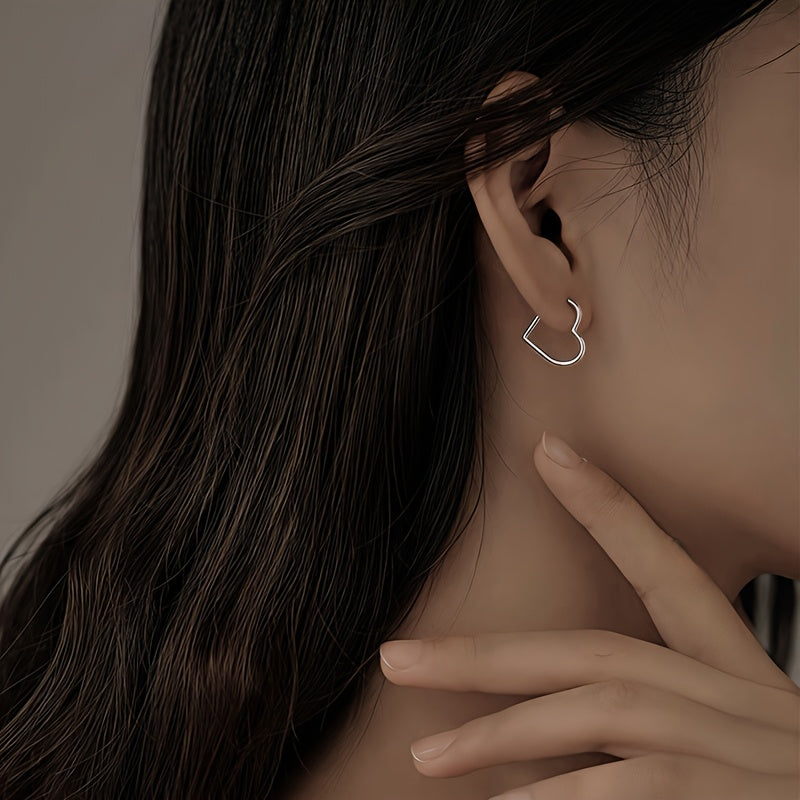 Pendientes dorados de acero inoxidable con forma de corazón