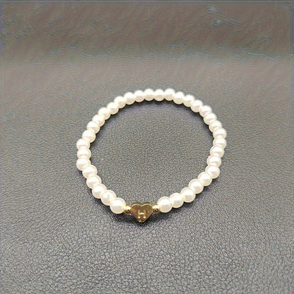 Pulsera chic con inicial de corazón (A–Z)