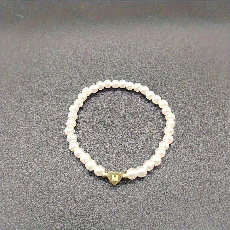 Pulsera chic con inicial de corazón (A–Z)