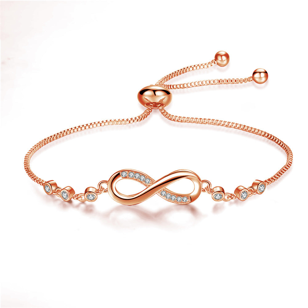 Pulsera chic ajustable en oro rosa en forma de símbolo del infinito
