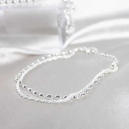 Set de pulseras de plata elegante con circonitas