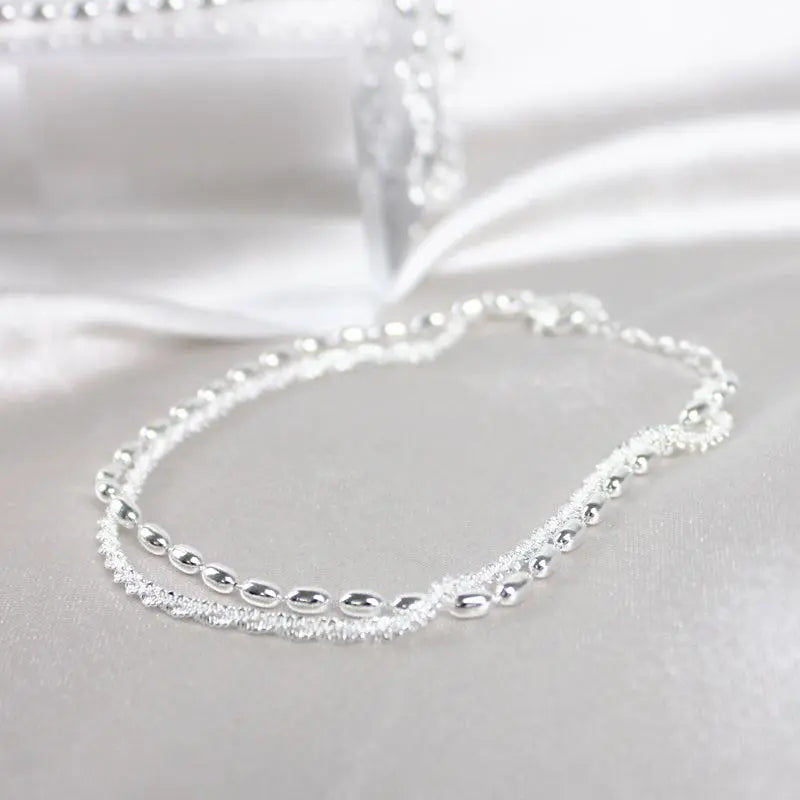 Set de pulseras de plata elegante con circonitas