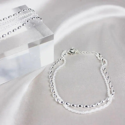 Set de pulseras de plata elegante con circonitas