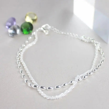 Set de pulseras de plata elegante con circonitas