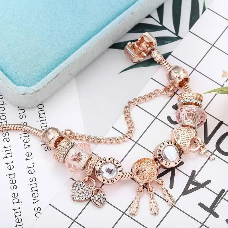 Pulsera atrapasueños rosa con charms de plata incluidos