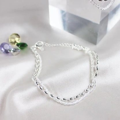 Set de pulseras de plata elegante con circonitas