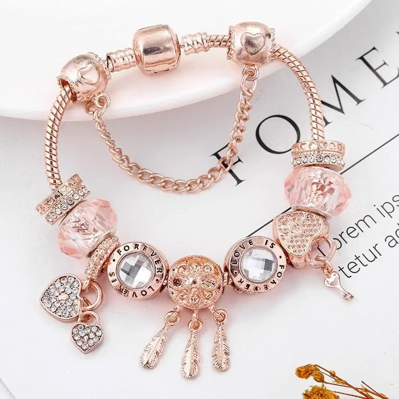 Pulsera atrapasueños rosa con charms de plata incluidos