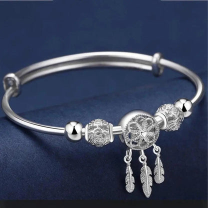 Pulsera rígida atrapasueños en plata