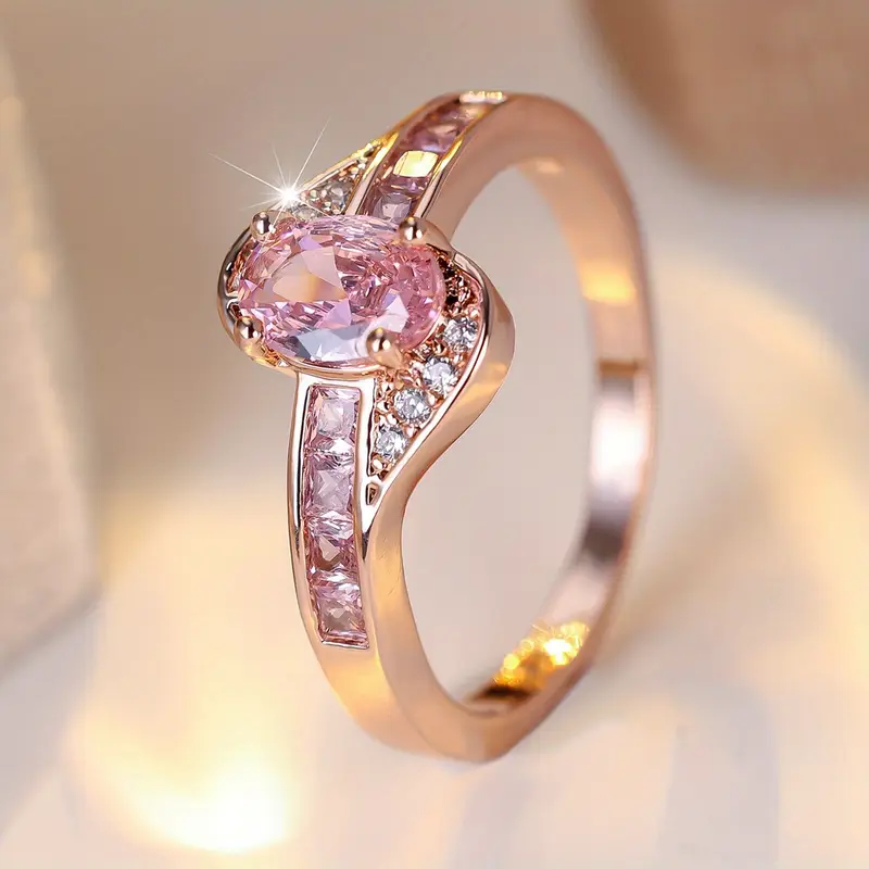 Anillo de oro con cristal rosa