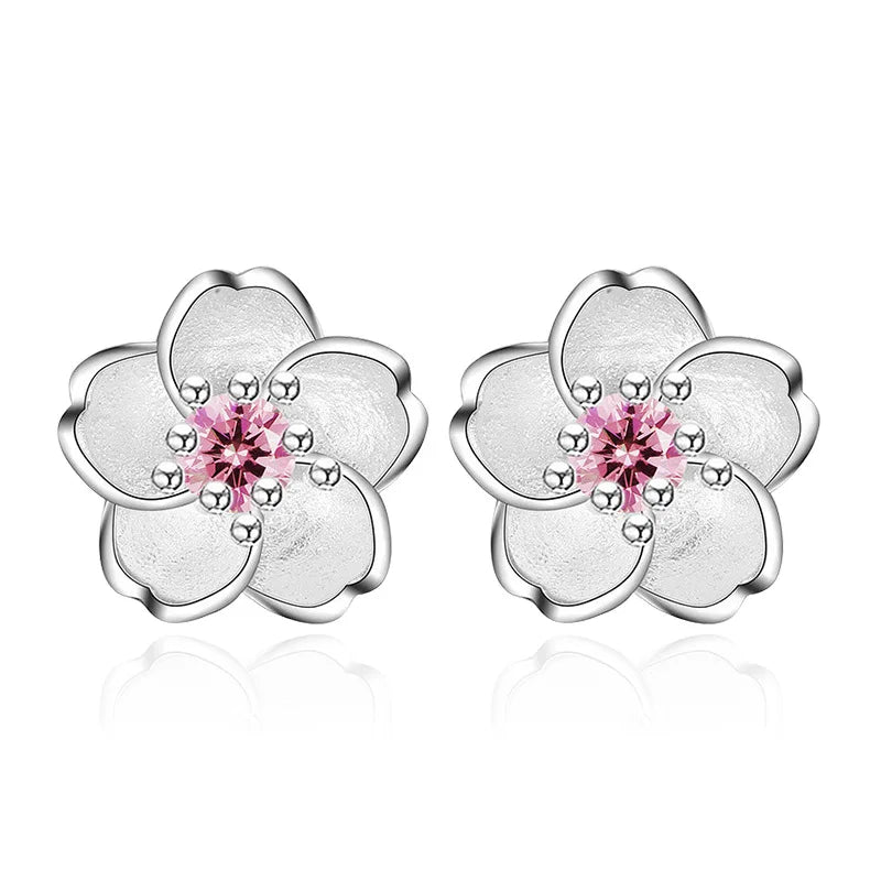 Pendientes de botón en forma de flor con circonita
