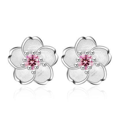 Pendientes de botón en forma de flor con circonita