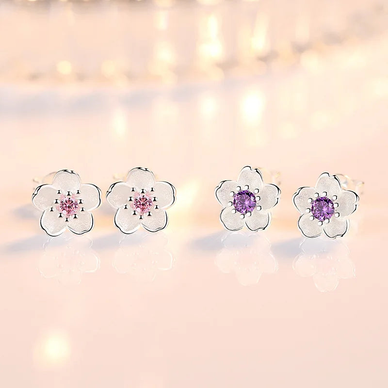 Pendientes de botón en forma de flor con circonita