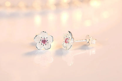 Pendientes de botón en forma de flor con circonita