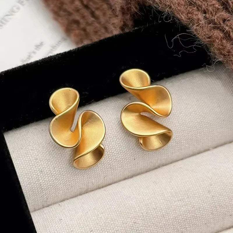 Pendientes de flor de plata y oro 18K